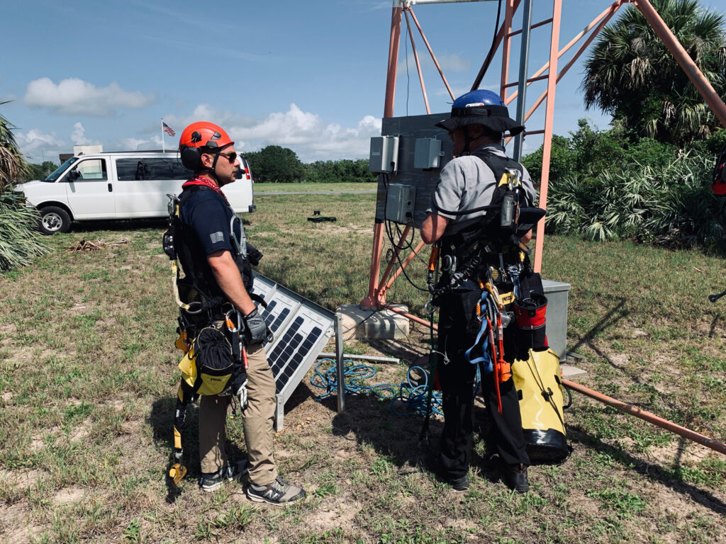 Engineers inspect tower equipments and structure