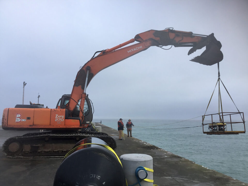 Engineers and equipment at the Navy Air Station Pier in Alaska